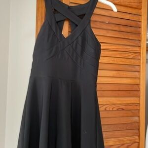 Beautiful Black Dress with Mesh details on back . Nice heavy material.